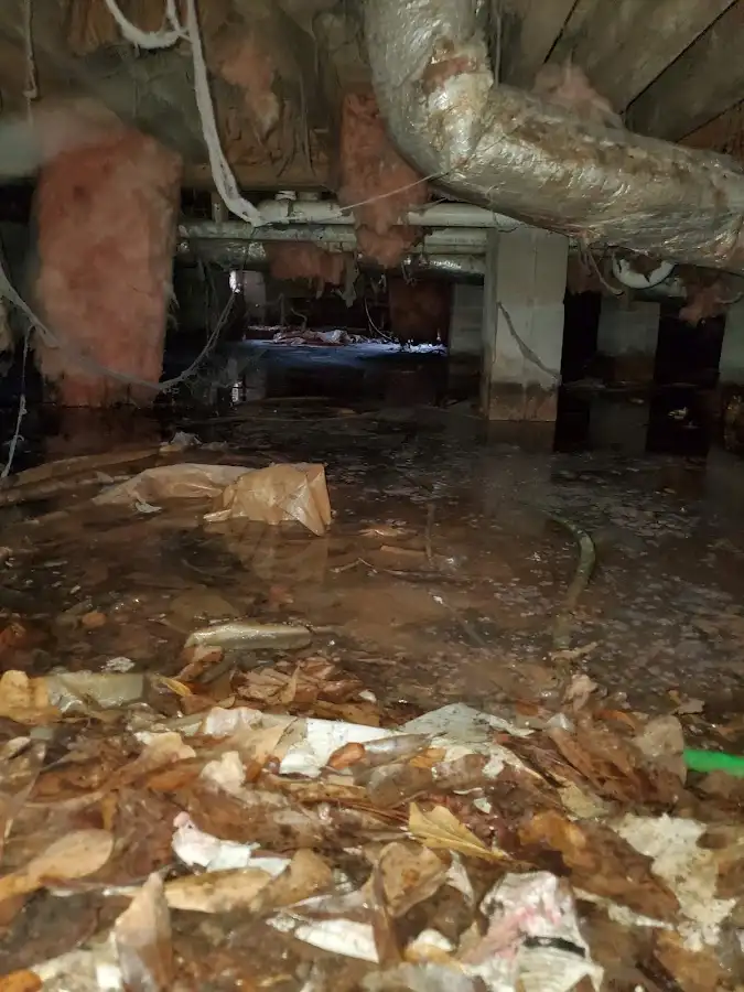 Crawl space flood assessment for Commercial Water Damage Restoration in Mendon